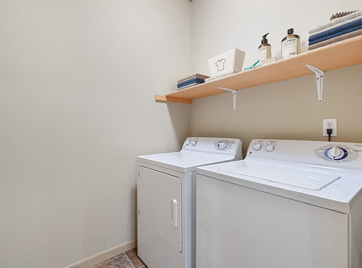 Washer and dryer with shelf for storage